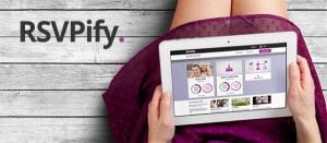 Woman using RSVPify event software on iPad